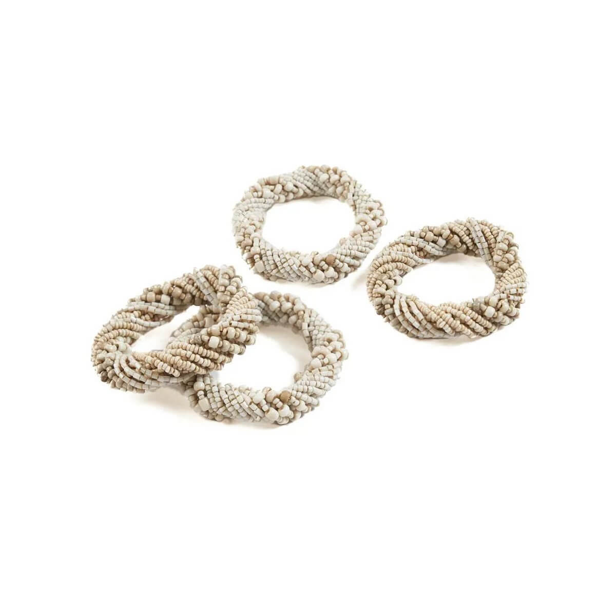 Elegant bohemian beaded napkin rings in white, set of 4, add style to table settings.