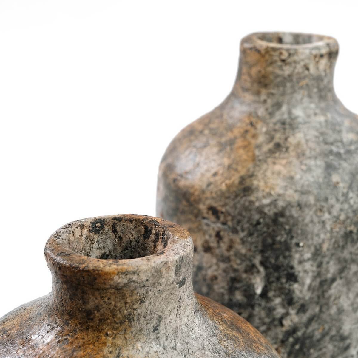 Bohemian style antique grey vases made of terracotta and rattan, showcasing rustic charm with unique texture and organic elegance.