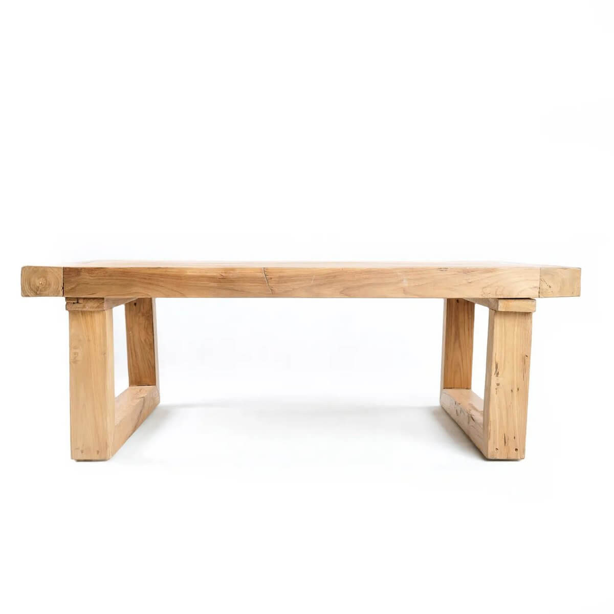 Bohemian style reclaimed teakwood coffee table with natural finish, adding sustainable elegance to any living room decor.