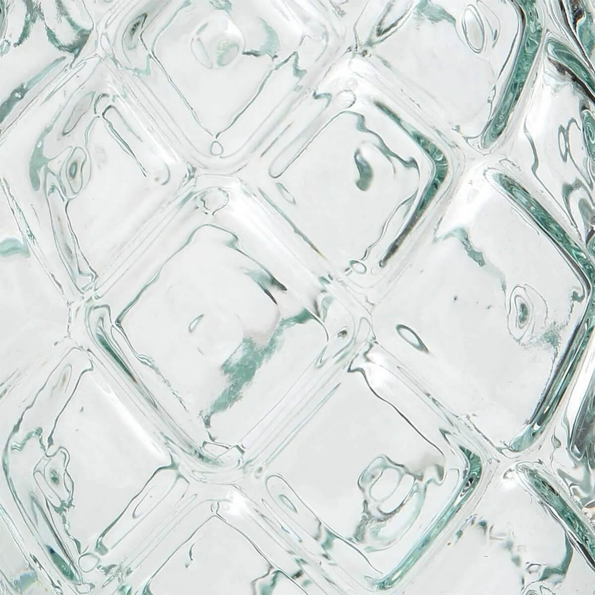 Close-up of The Pineapple Glass texture, showcasing its Bohemian, pineapple-inspired design in recycled glass.