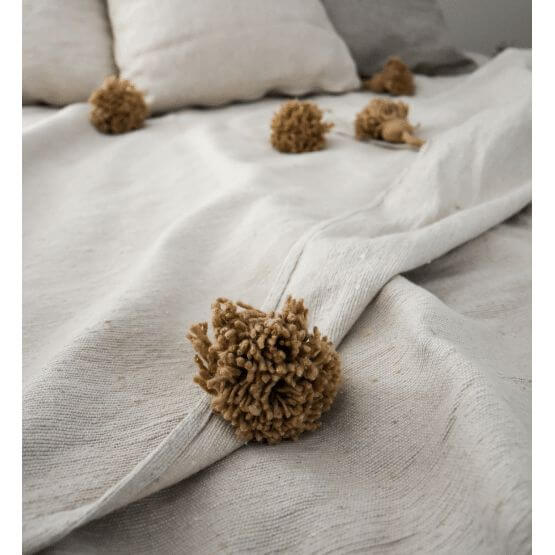 Pompondeken creme en beige