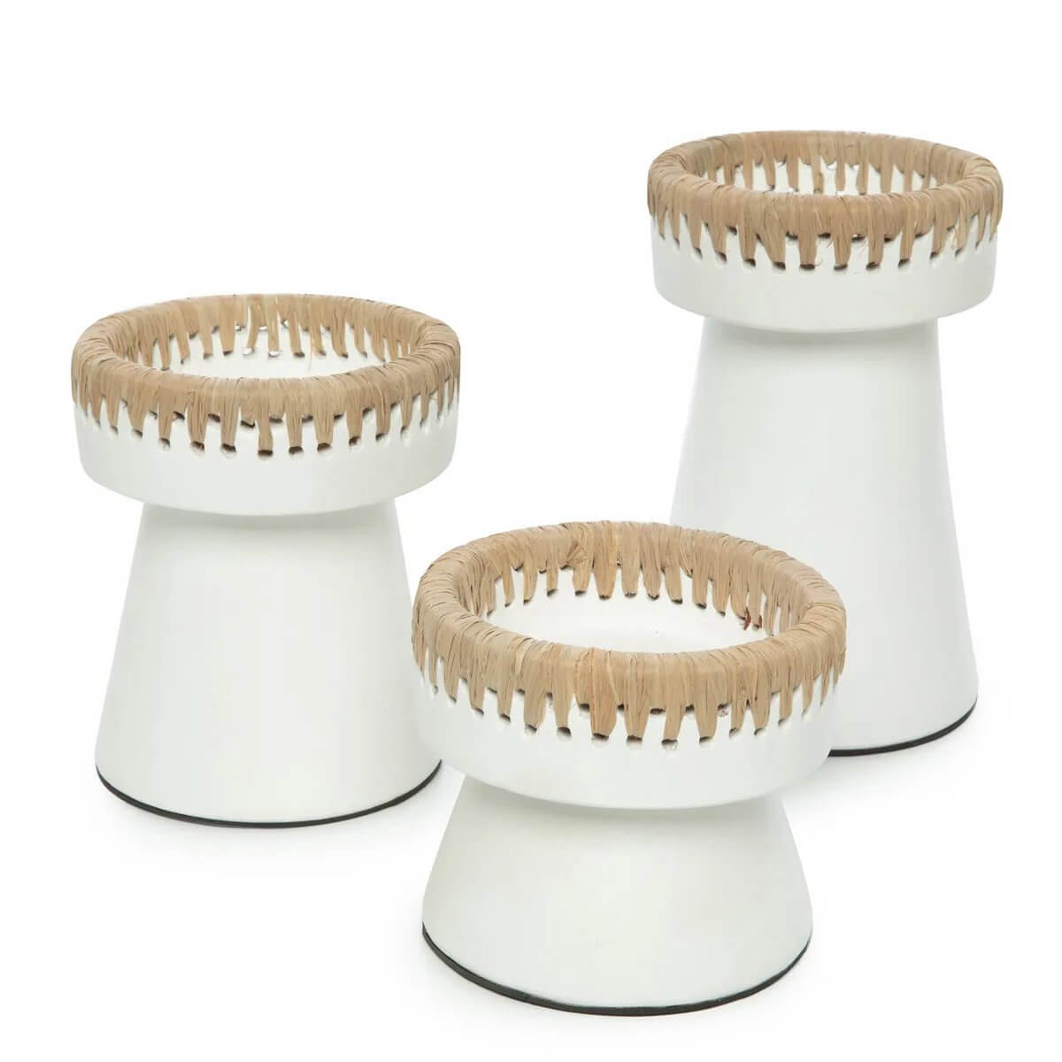 Chic Bohemian white candle holders with raffia accents, perfect for stylish table décor. Small size in terracotta material. Set of three.