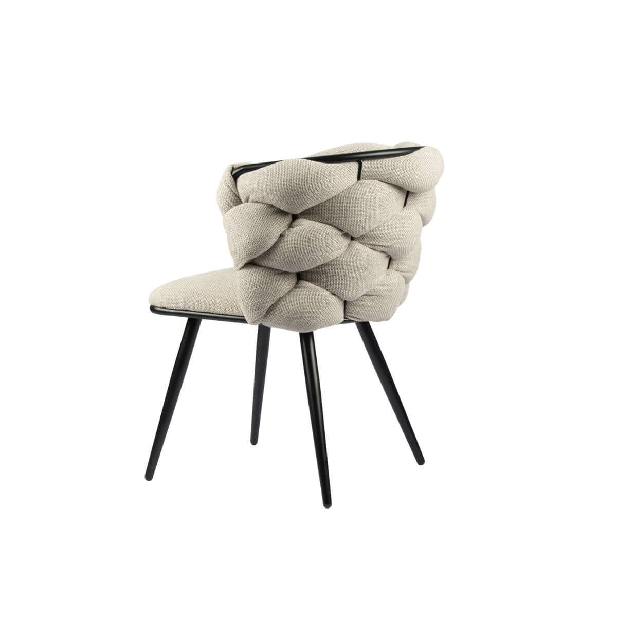 De Rock chair in beige, elegant design met uniek weefpatroon en luxe uitstraling, perfect voor moderne interieurs.