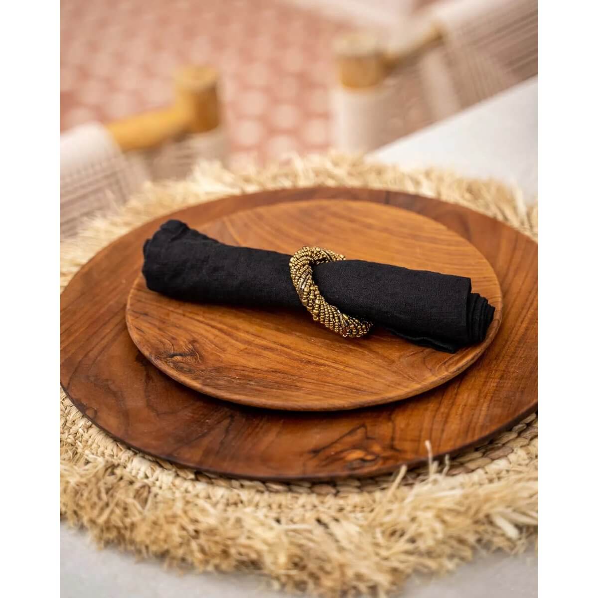 Alt Tag: Bohemian teak root round plate with a black napkin, perfect for adding a rustic touch to any table setting. Size: 24.5cm.