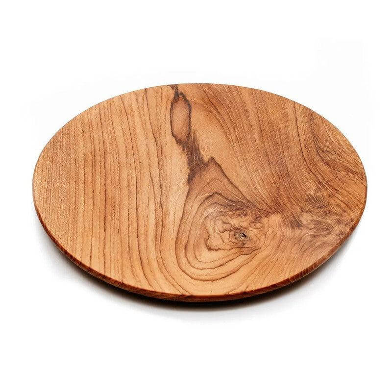 Teakhouten ronde schaal - XL, ideaal als serveerbord of onderzetter. Voeg een warme houten toets toe aan je tafeldecoratie met Bazar Bizar Living.