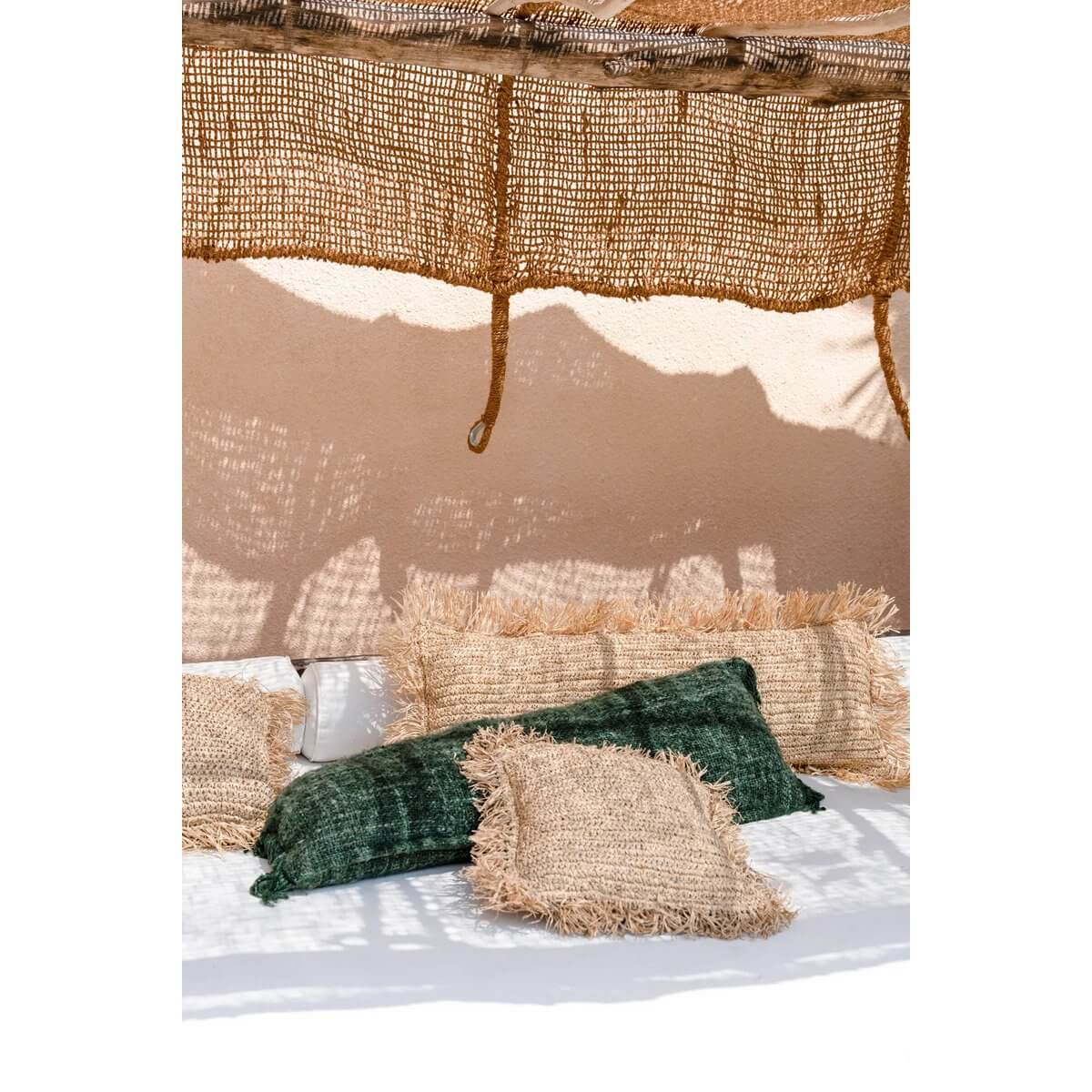 Charming Bohemian Coco Shade 300x200 in natural color over cozy pillows, ideal for small terraces and decorative elements. Earthy summer vibes.